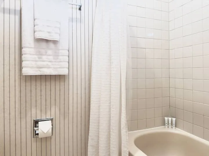 Downstairs bathroom two with full tub and shower combo